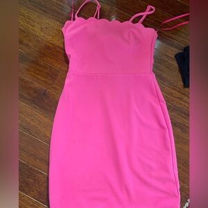 Bright pink body con dress